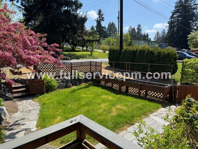 Photo - Spacious 4-Bedroom Upper-Level Home with Fireplace, Bonus Room & Large Deck