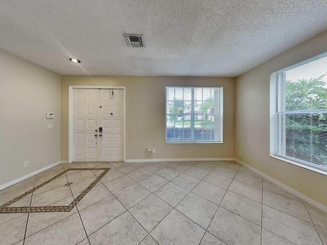 Building Photo - 5730 NW 62nd Manor Rental