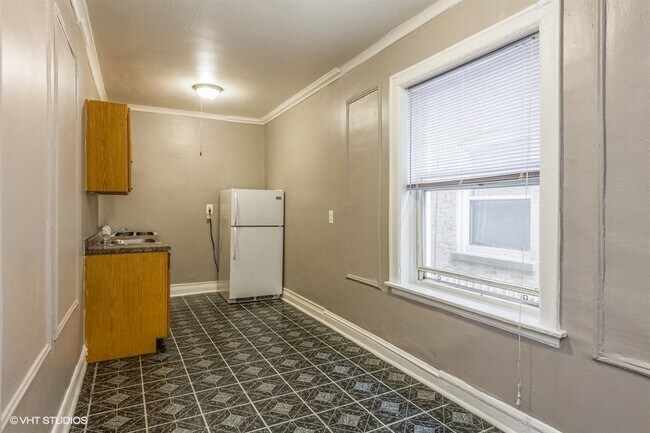 Functional galley-style kitchen perfect for everyday cooking.