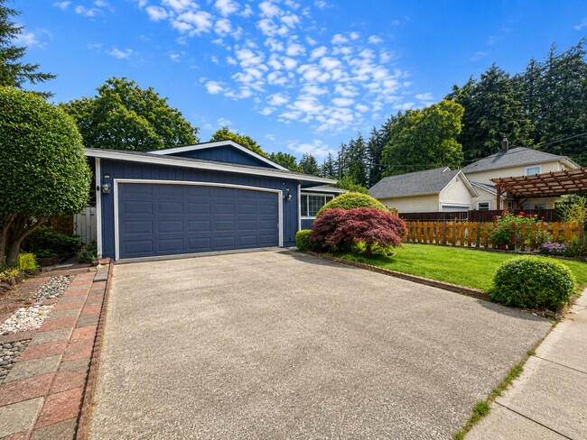 Photo - Single-Level 3-Bedroom Home with 2-Car Garage, Mini-Split AC, & Backyard Garden Space