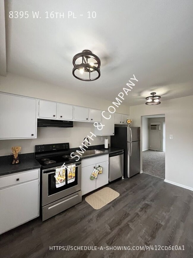 Building Photo - 8395 W 16th Pl Unit 10