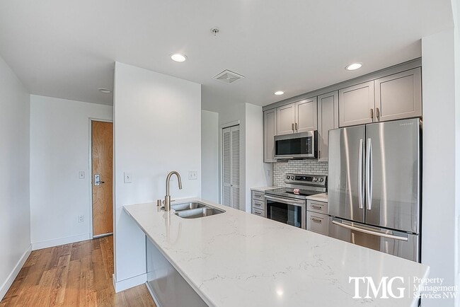 Photo - Top-Floor 2BD/2BA Condo w/ Stunning Park Views & Utilities Included Unit 704