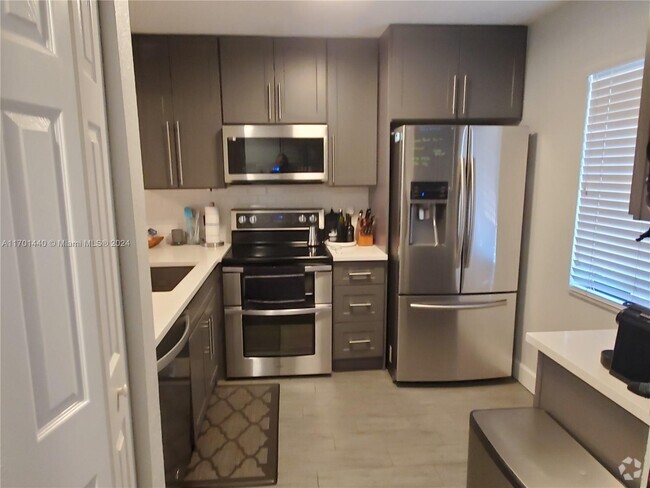 Building Photo - 10451 W Broward Blvd Unit 103 Rental