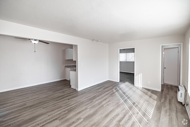 2BR, 1BA - 869SF - Living Room - Courtyard Apartments