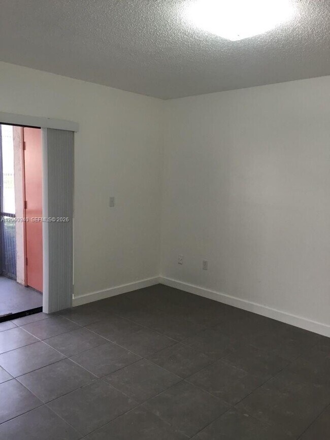 Photo - 860 NE 209th Terrace Unit 104-33