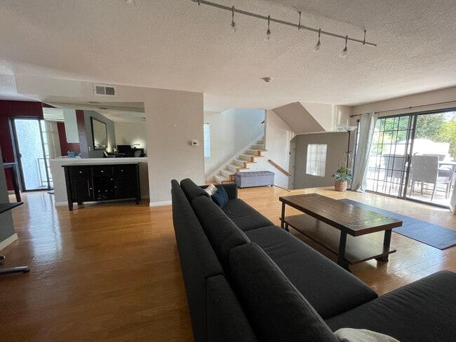 Living room/Front door/Stairs to 2nd floor - 231 N Broadway