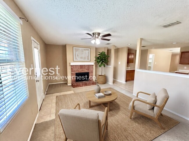 Photo - 4 Bed, 2 Bath Home with Fenced Yard & Garage / Available Now!