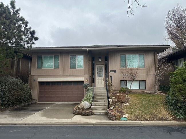 Building Photo - Spacious Millcreek Townhome with Two Living Areas, Private Deck & Community Amenities