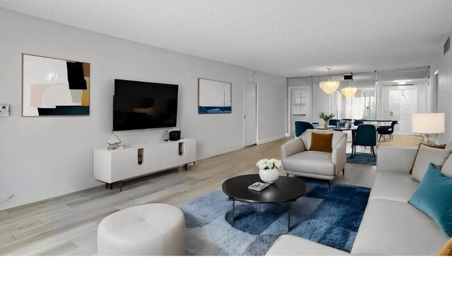 Building Photo - 4020 W Palm Aire Dr Unit 402
