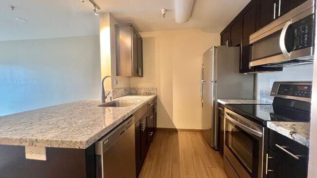 Photo - Top Floor Sweet and Spacious studio with resort style amenities and In-Unit Washer & Dryer! Unit 3406
