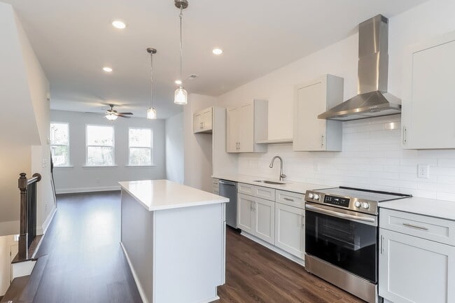 Photo - Beautiful 3BR 3.5BA Townhome w/ Full Appliance Kitchen • Garage Parking in West End