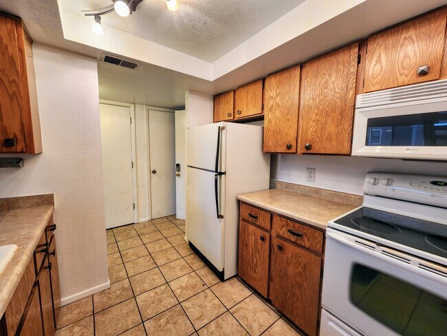 Kitchen - 4896 S Dudley St Unit 8-10