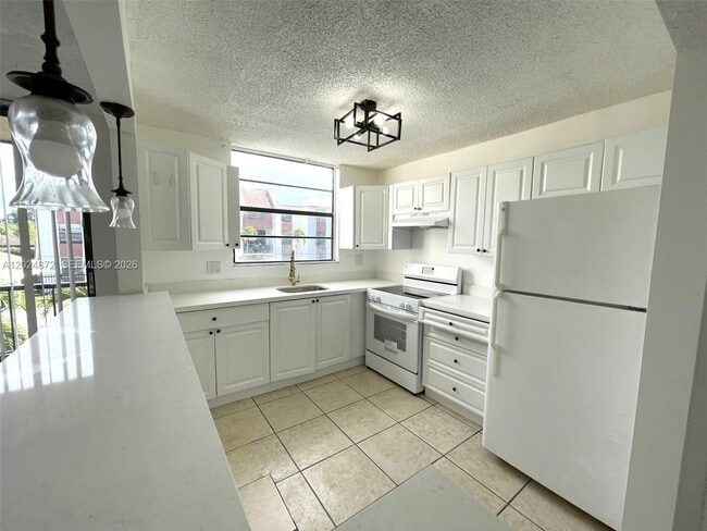 Building Photo - 1788 NW 55th Ave Unit 204