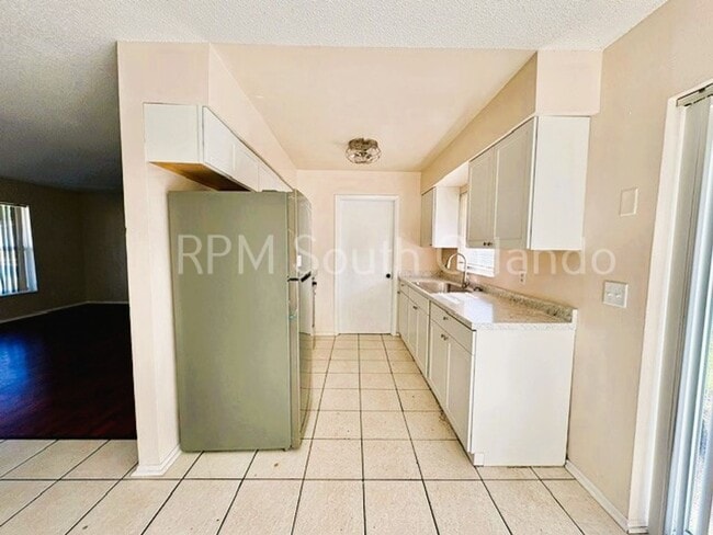 Photo - Charming 3-bedroom, 2-bathroom home Located in a well-established neighborhood in Ocoee