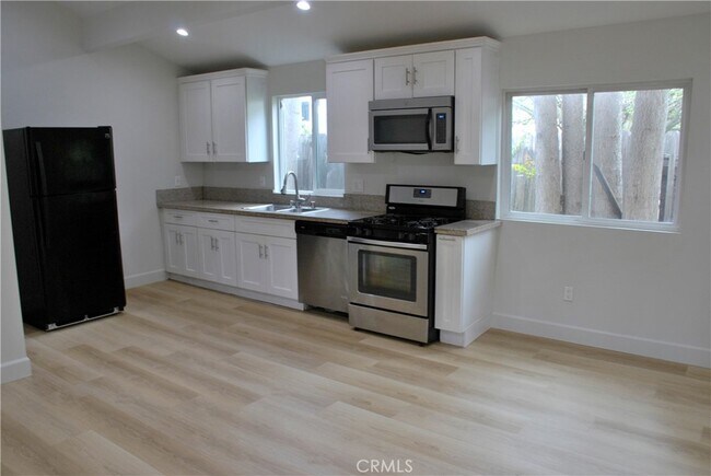 Building Photo - 7053 Corbin Ave Unit 7053 Rental