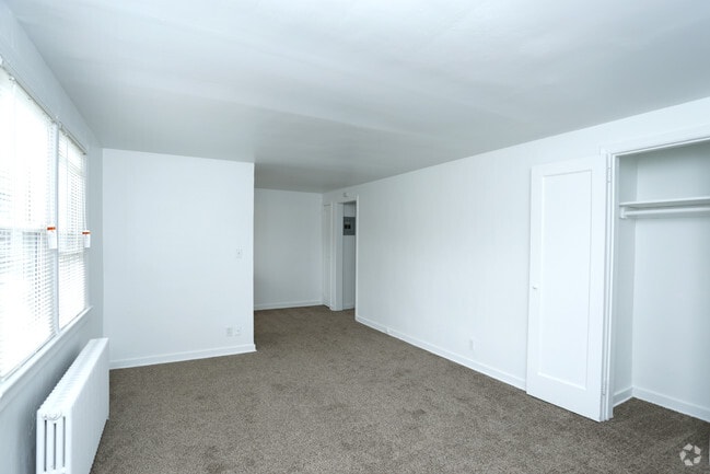 One Bedroom(upstairs w/carpet) - Living Room - Warner Village Apartments