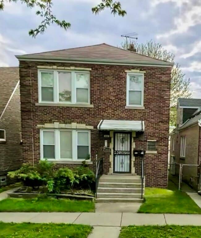 Building Photo - 8532 S Yates Blvd Unit 1
