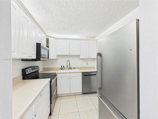 Building Photo - 4113 NW 88th Ave Unit 105 Rental