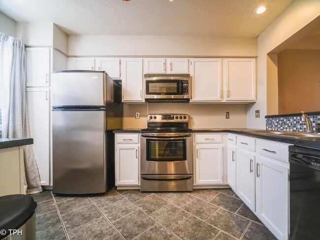 Photo - "Charming 2-Bedroom Gem with Granite Elegance in Charlotte's Heart!"