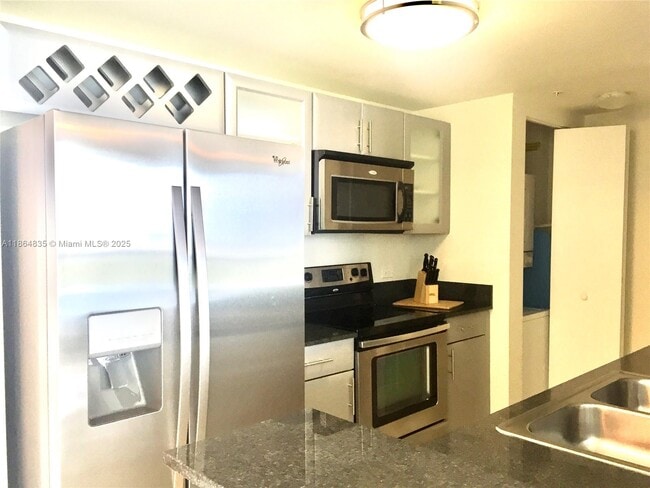 Photo - 1871 NW S River Dr Unidad 1006