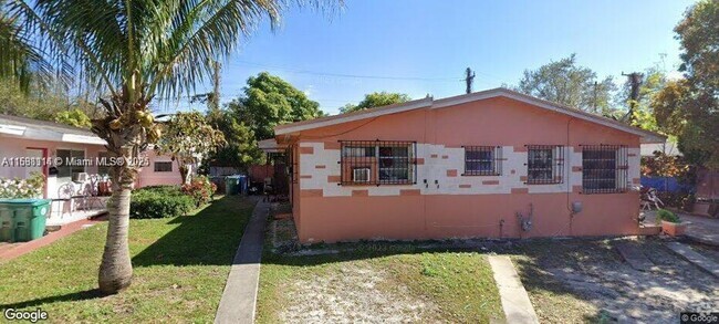 Building Photo - 5511 NW 1st Pl Unit front Rental