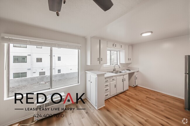 Building Photo - ~1 Month FREE~ Spacious and Sun-Drenched T... Unit 204 Rental