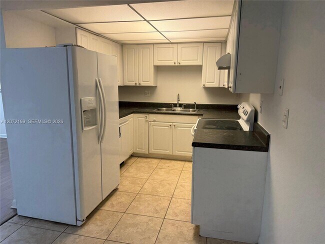 11101 Royal Palm Blvd Unit 203
