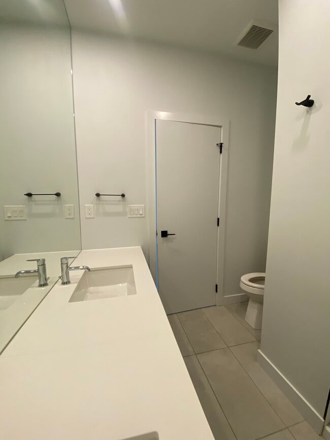 Photo - Killarney – a quiet, family-friendly neighborhood close to parks and tennis courts. Unit U3