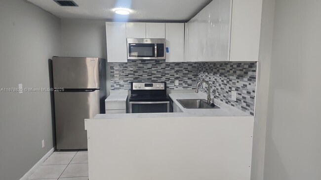 Building Photo - 11544 NW 44th St Unit 0 Rental