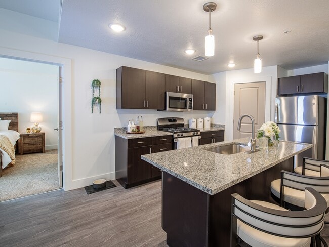 Granite Countertops, Pendant Lighting - Point of View Apartments
