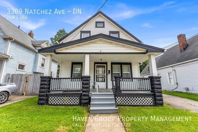 Building Photo - 3309 Natchez Ave Unit DN