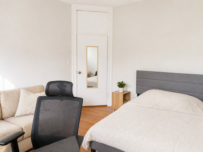 Photo - Sunlit Top-Floor Retreat: Charming 3-Bedroom in Coolidge Corner with Deck & Pet-Friendly! Laundry...