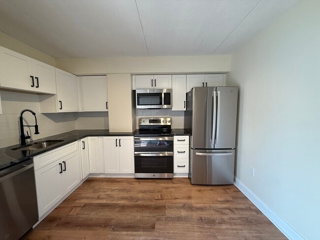 Building Photo - 280 Harvard St Unit 2D