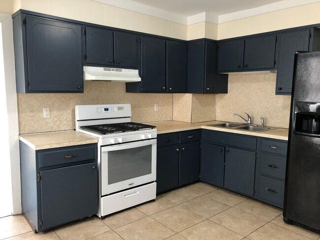 Photo - Great Home! Spacious and Updated! Wood Flooring! New Window! Eat-in-Kitchen! Yard!