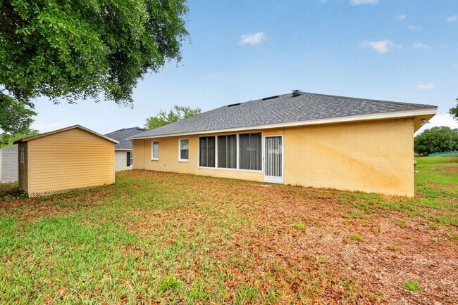 Photo - Available Now! Move-In Ready 3BR Home with Florida Room & Shed