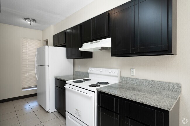 1BR, 1.5BA - 875SF - Kitchen - Sunshine Village Apartments