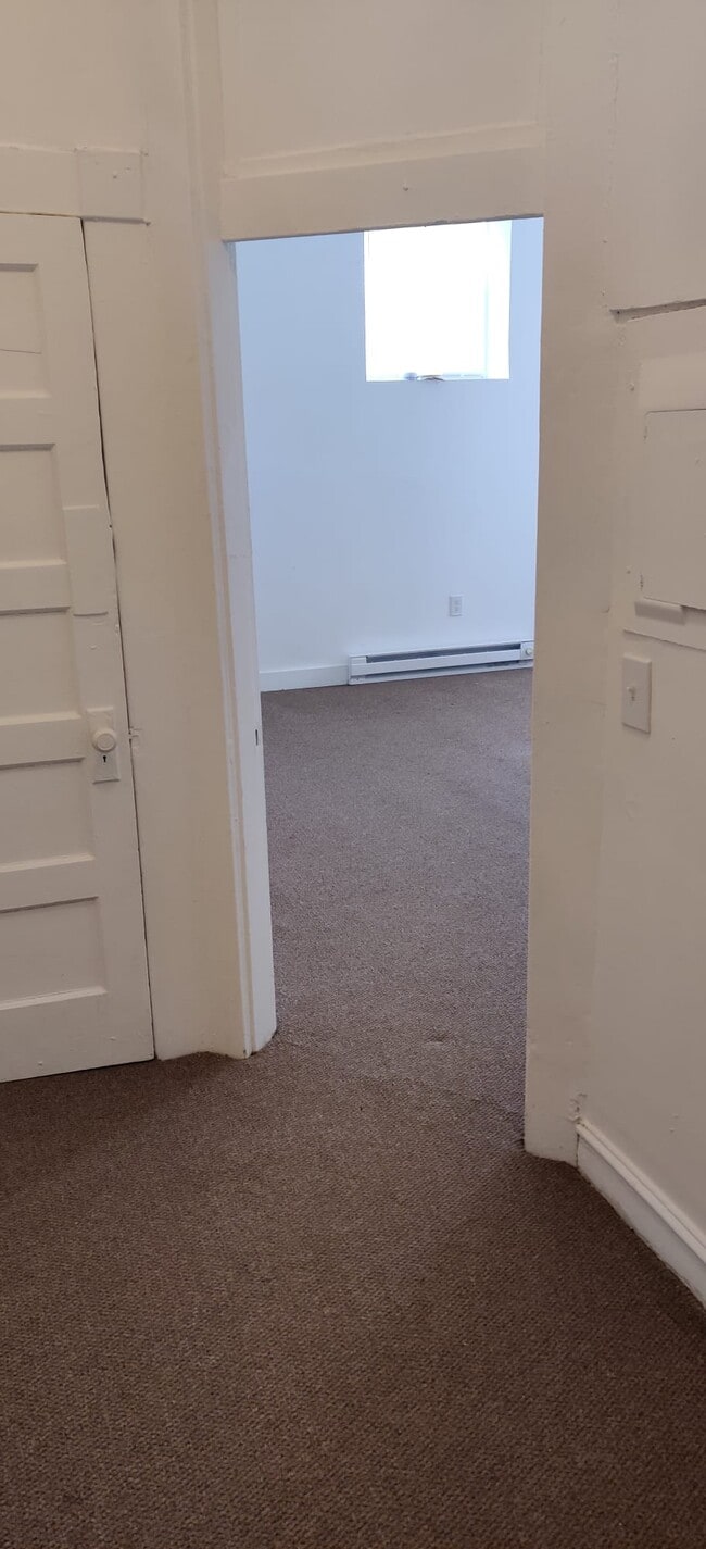 Hallway view into LR/DR - 2321 Eutaw Pl Unit 1B