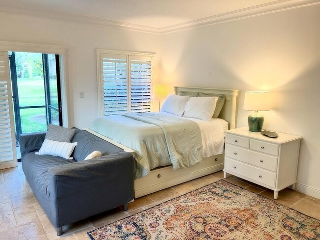 Building Photo - 11863 Wimbledon Cir Unit 408