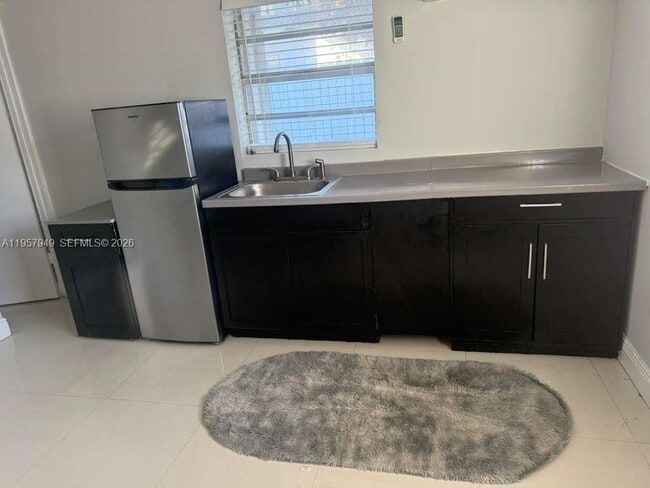 Building Photo - 3100 NW 91st St Unit 3100