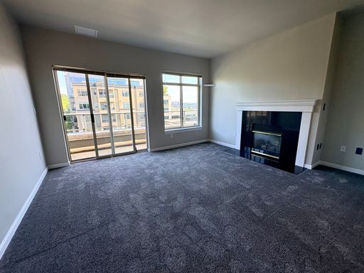 Photo - Top-Floor Corner 2BR with Lake Union Views + Garage Parking Included!