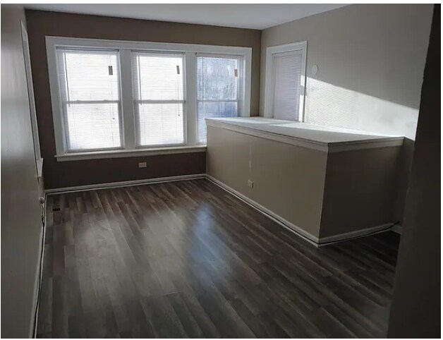 Building Photo - 8155 S Merrill Ave Unit 1N