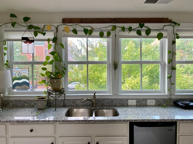 Sink contains disposal. - 2115 Main Line Blvd Unidad Carriage House