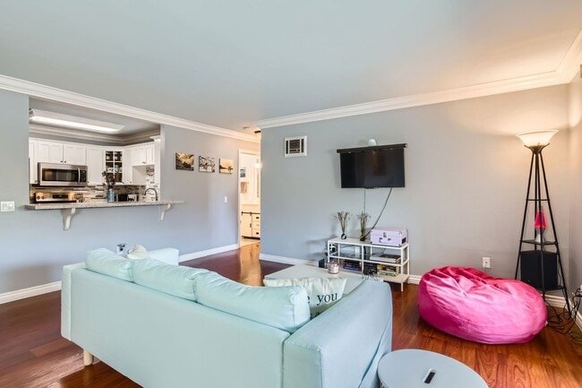 Photo - Renovated 3-Bed Condo with In-Unit Laundry, Garage & Pool