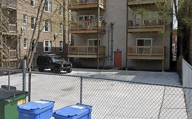 Enclosed parking with remote gate opener, back deck (upper left) - 4346 S Lake Park Ave Rental