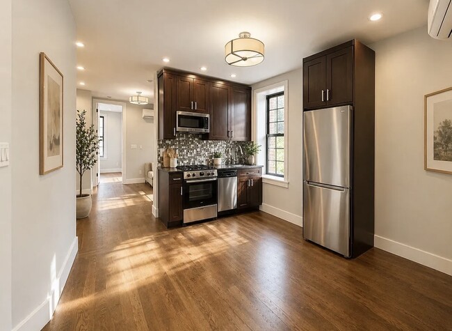 Building Photo - 6702 60th St Unit 1