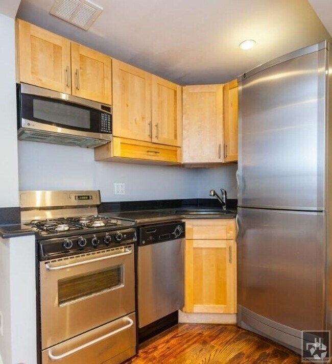 Building Photo - E 5TH ST. Unit 9 Rental