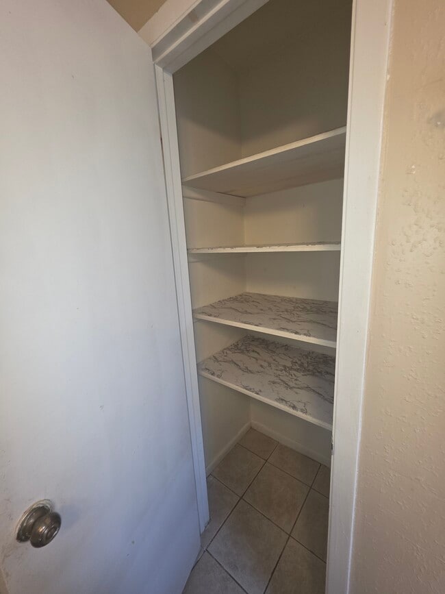 bathroom storage closet - 1205 Anne Ave Unit A