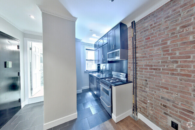 Building Photo - 434 W 52nd St Unit 7 Rental