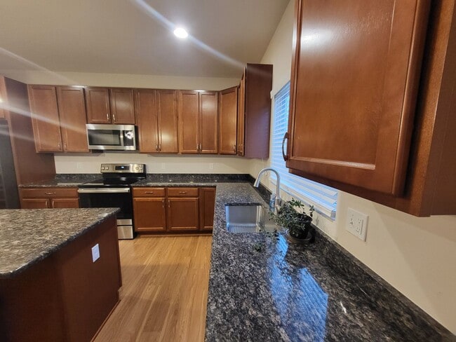 Photo - Spacious 4-Bedroom, 2.5-Bath Home Near Dow...