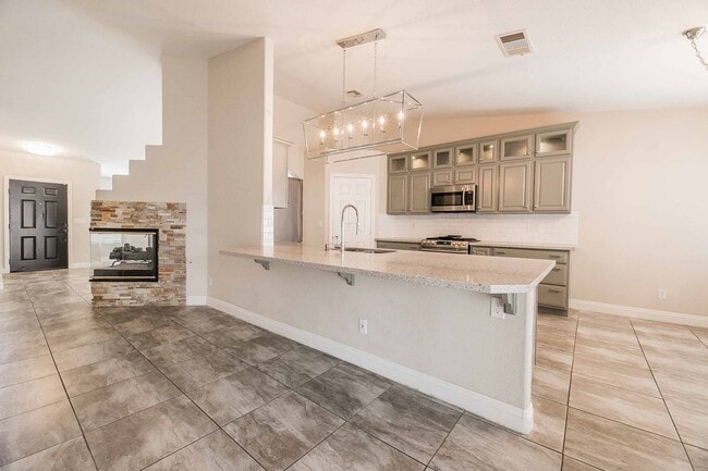 Photo - STUNNING 3 Bedroom Home with a 3 CAR GARAGE & RV PARKING!